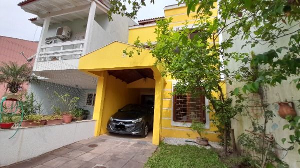 Casa à venda com 3 quartos, 125m² - Foto 1