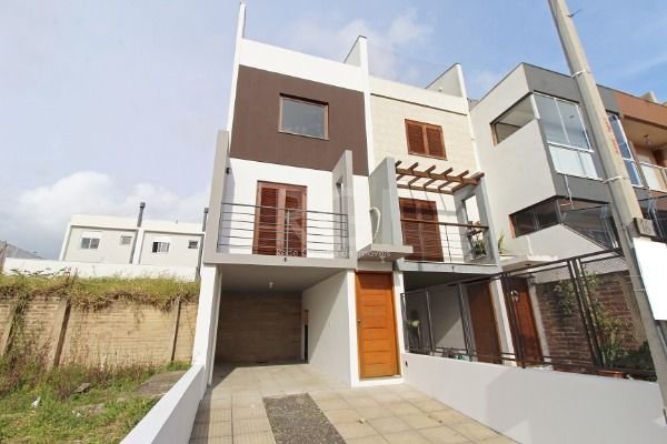 Casa à venda com 3 quartos, 109m² - Foto 1