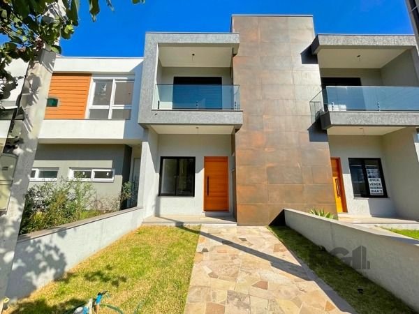 Casa com 127m², 3 dormitórios, 1 suíte, 2 vagas no bairro Hípica em Porto Alegre para Comprar