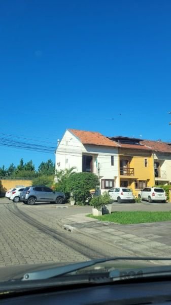 Casa Condominio à venda com 2 quartos, 122m², 1 vaga, Avenida Edgar Pires de Castro no bairro Hípica em Porto Alegre