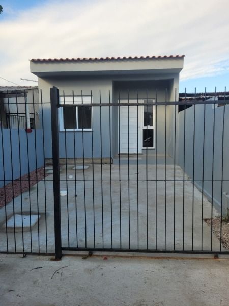 Casa com 63m², 3 dormitórios, 1 suíte, 1 vaga no bairro Hípica em Porto Alegre para Comprar