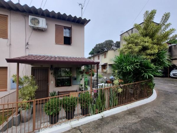 Casa Condominio à venda com 2 quartos, 50m², 1 vaga, Avenida Vicente Monteggia no bairro Vila Nova em Porto Alegre