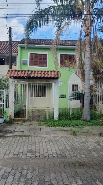 Casa com 100m², 3 dormitórios, 1 vaga no bairro Nova Ipanema em Porto Alegre para Comprar