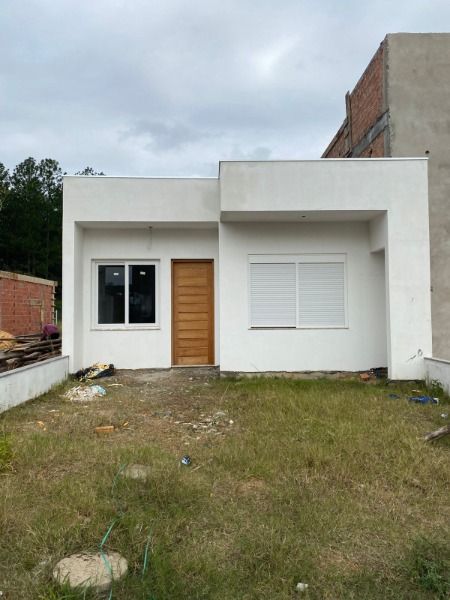 Casa à venda com 3 quartos, 100m² - Foto 1