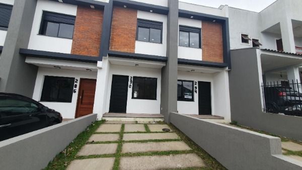 Casa com 102m², 2 dormitórios, 2 suítes, 1 vaga no bairro Hípica em Porto Alegre para Comprar