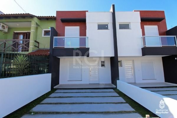 Casa à venda com 3 quartos, 100m² - Foto 1