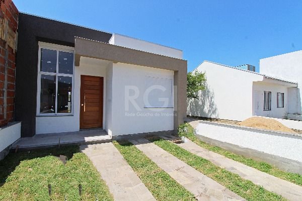 Casa à venda com 3 quartos, 90m² - Foto 1